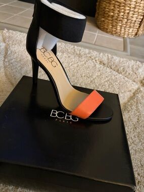 BCBG Paris Black Ankle-Strap Stiletto with Orange Toe Band